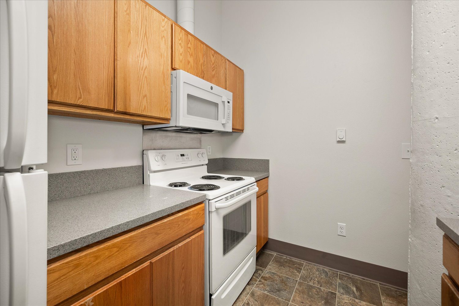 Galley Kitchen - Stove and Microwave